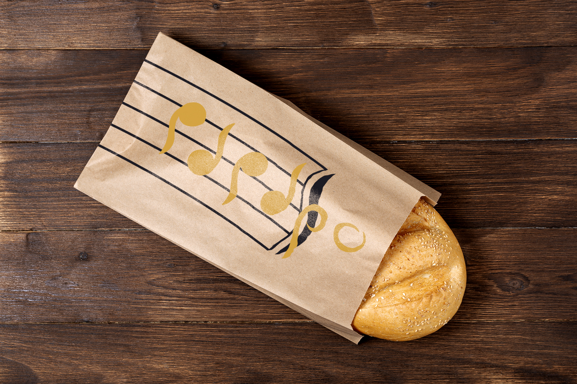 classic loaf in a steam package that is made of recycled material on a wooden background, paper bag concept
